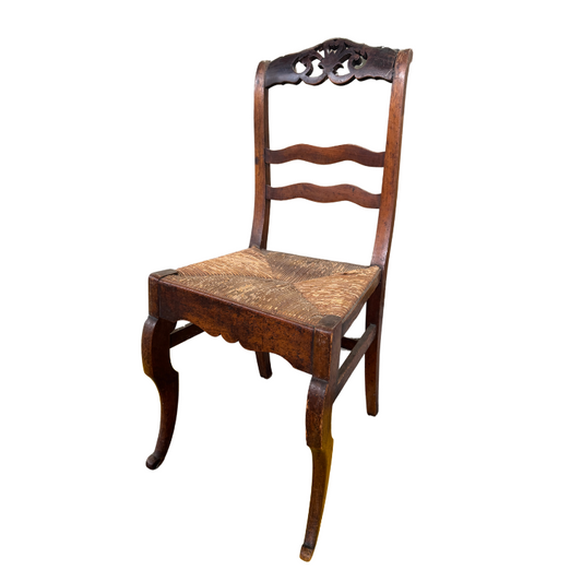 Antique French wicker chair with cracked coquille carvings detail from Annecy