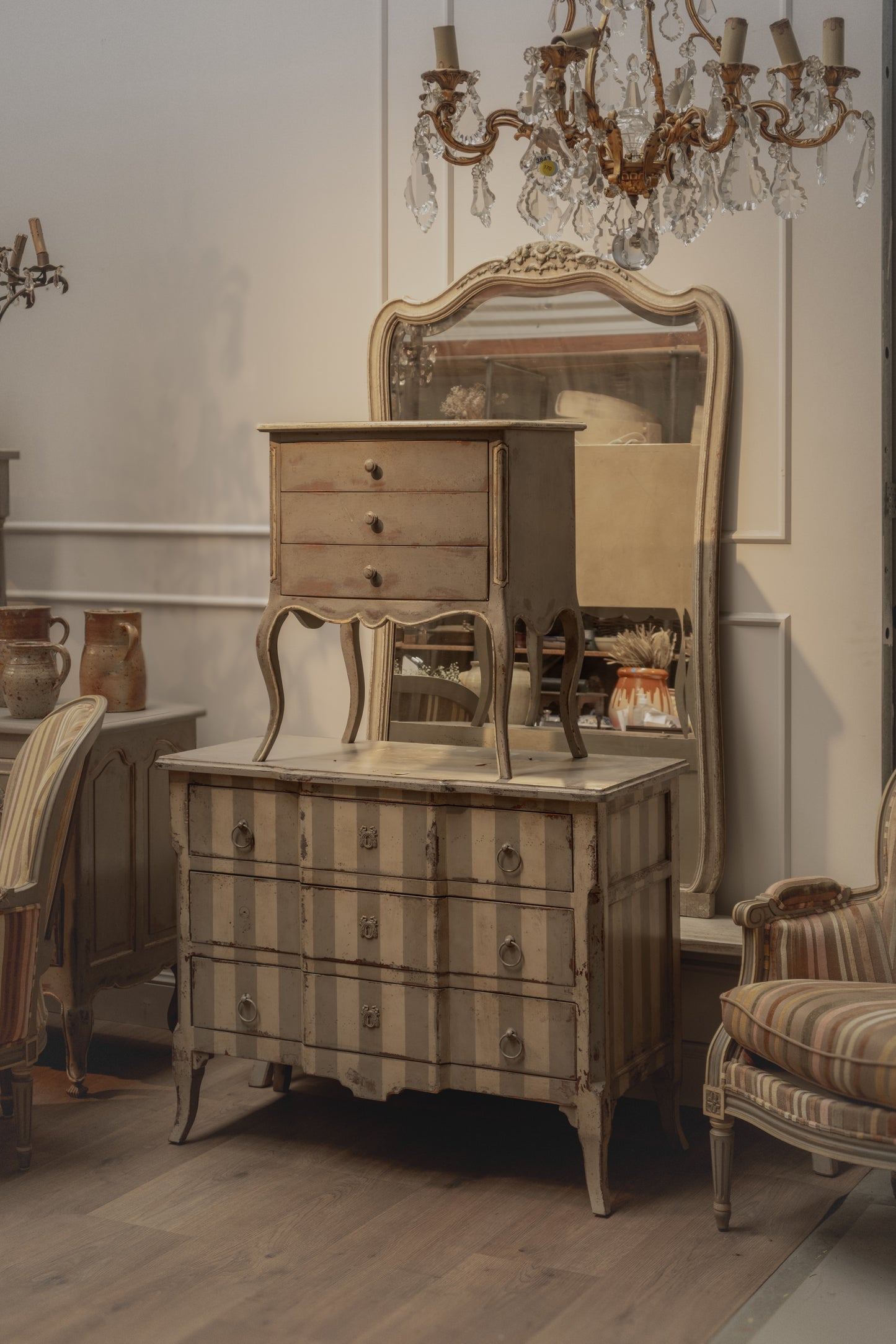 Antique French Louis XV style commode with a lovely time worn grey striped design from Courchevel