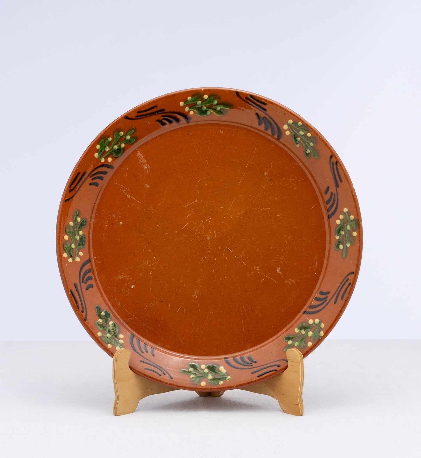 Beautiful antique French large serving platter with black swirls and green floral motifs with an aged patina from Annecy