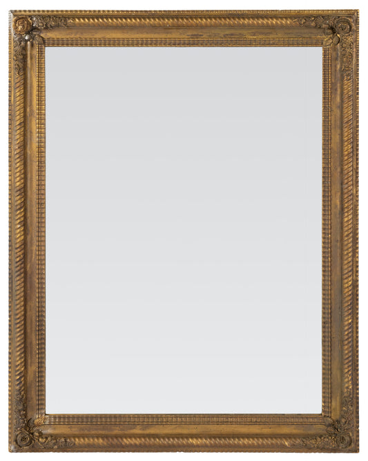 Stunning large Antique French 19th Century mirror with elegant frame with floral decals in the corners and a twisted rope border characteristic of the Louis Philippe or Napoleon III periods.