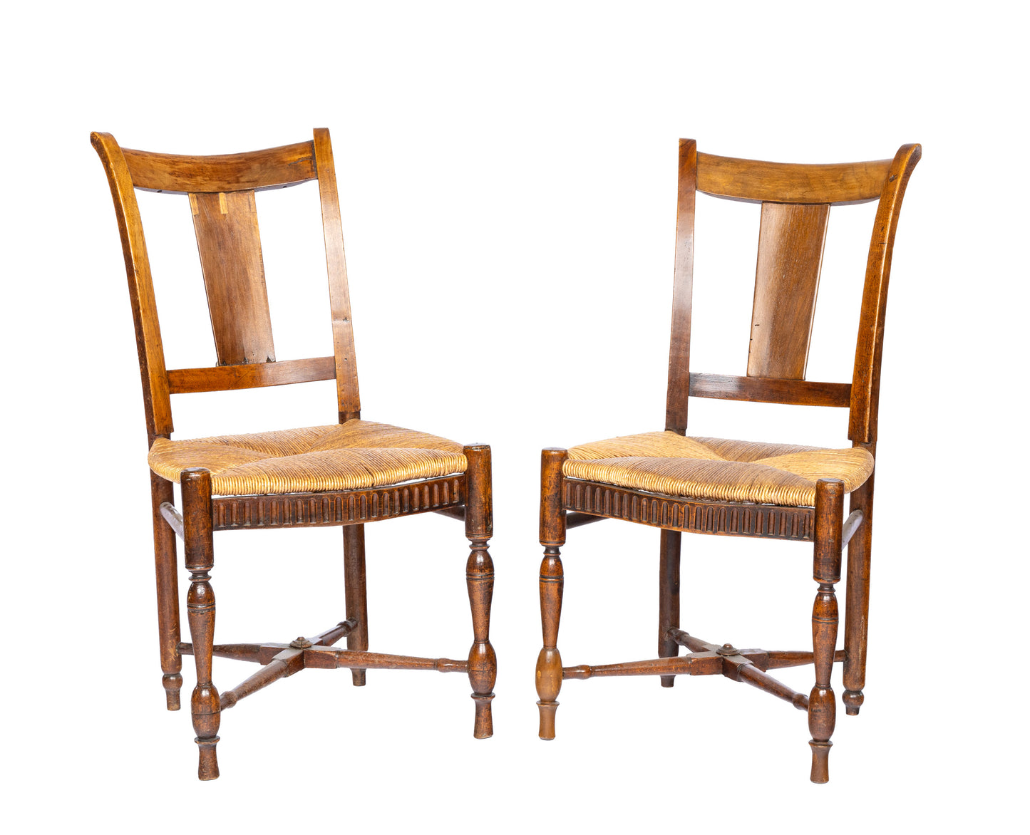 A lovely pair of Antique French farmhouse chairs with wicker seats from the French Alps