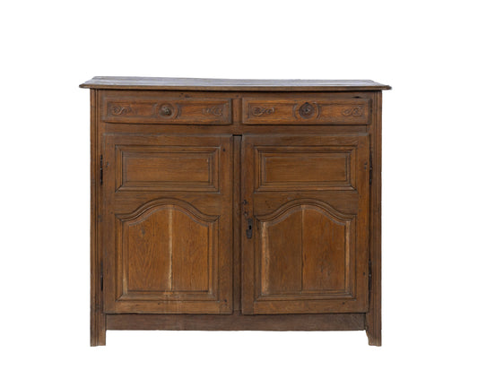 Charming 18th Century oak sideboard with delicate floral carved motifs from the French Alps.