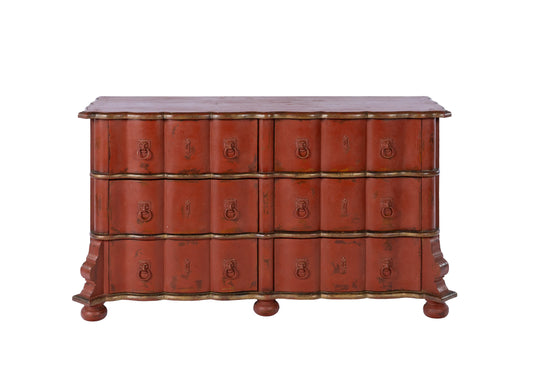 Statement Antique French 18th Century Louis XV style commode with red patina and gracefully curved serpentine front from Provence
