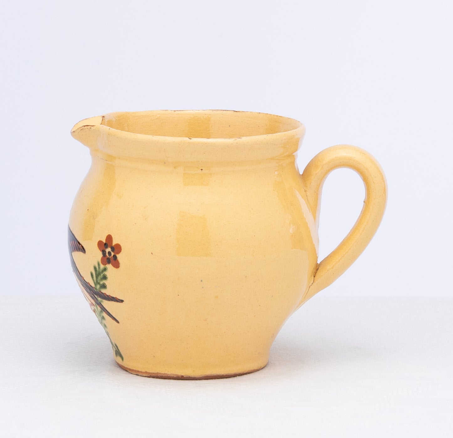 Lovely vintage French large jug with bird and floral motifs from the French Alps