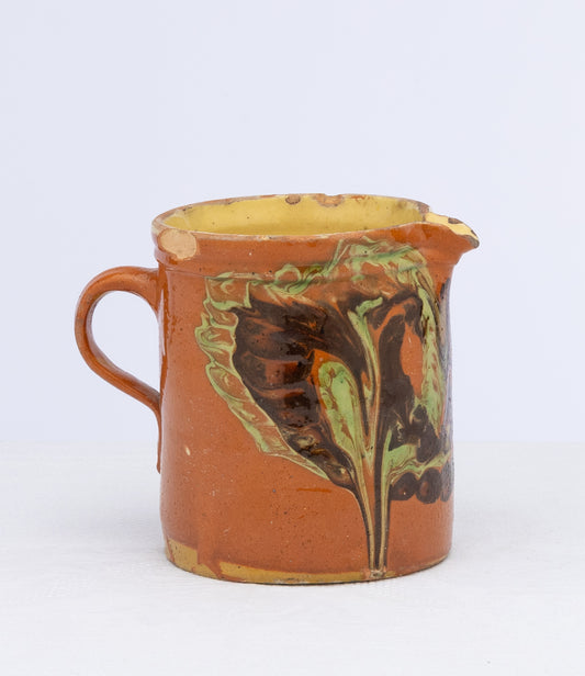Vintage French glazed earthenware pitcher from the French Alps with marbled design