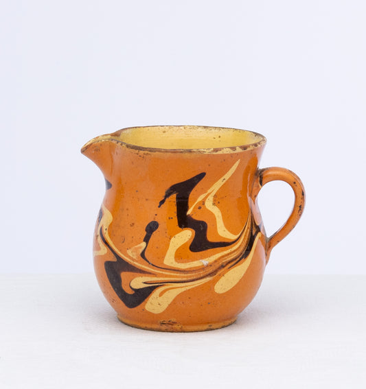 Vintage French glazed earthenware jug from the French Alps with marbled design