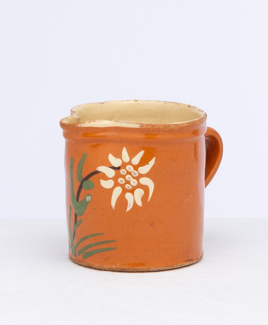 Vintage French Small orange glazed hand painted jug with floral motif from the Alps