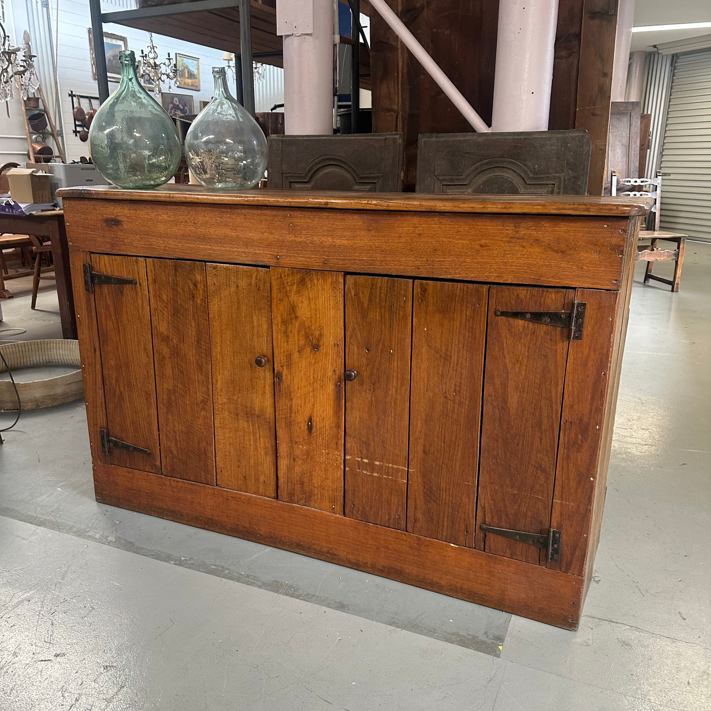 Vintage walnut farmhouse sideboard featuring internal shelves and a warm honey-coloured finish