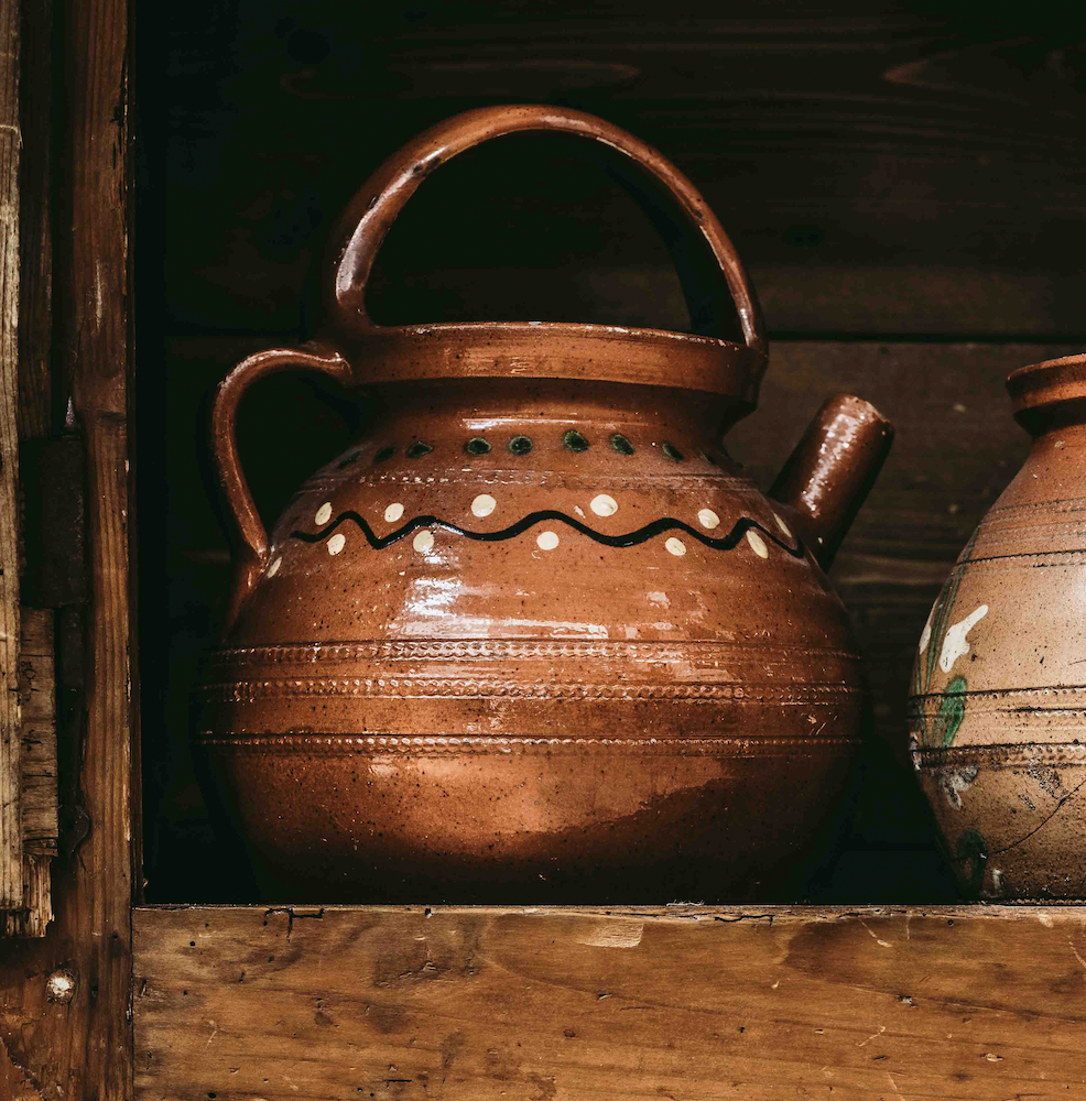 Antique French savoyard pot with spout and hand painted designs, from the French Alps