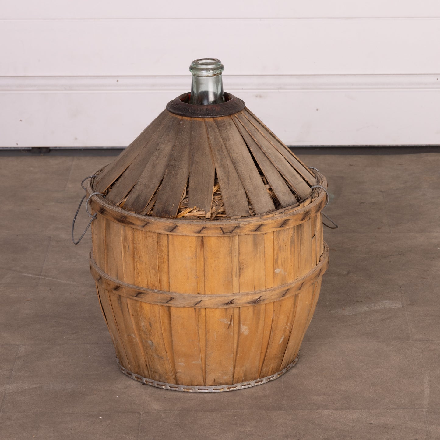 Antique French Demi John wine bottle in casing from Provence - part of a larger collection