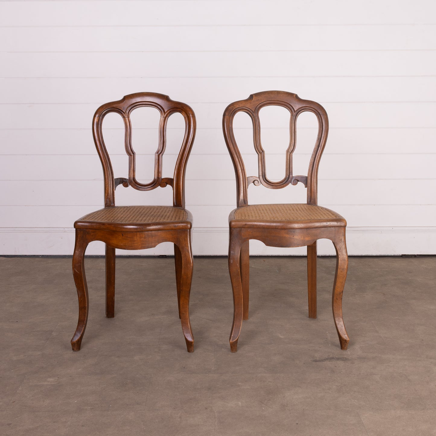 Set of 9 Antique French cane dining chairs from Provence