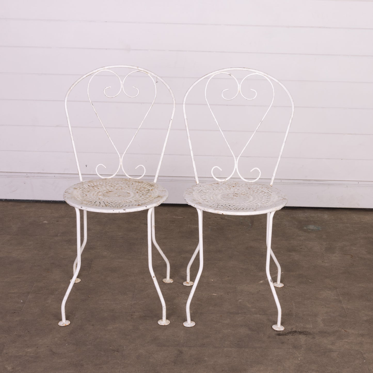 Set of 4 Vintage French outdoor wrought iron armchairs with a white patina