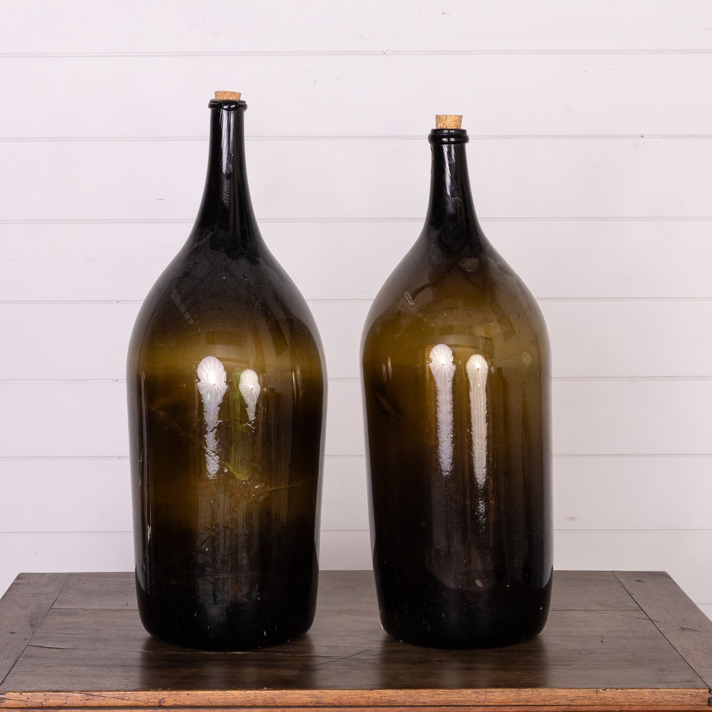 Pair of sought after Dame-Jeanne oversized wine makers bottles 18th century