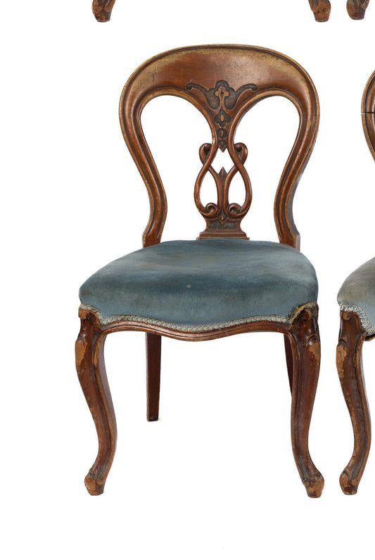 Early 20th Century antique French timber dining chairs with upholstered seats and hand carved backs. Discovered in an old mansion in Megève