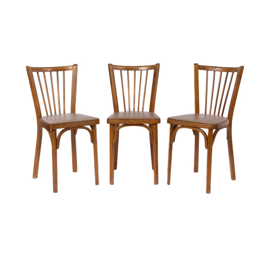 A lot of 3 vintage French timber chairs with leather seats from The French Alps