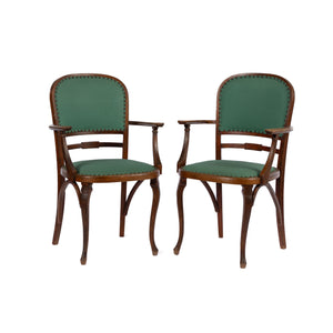 Pair of rare Vintage French oak armchairs with green fabric and studwork. Discovered in The French Alps