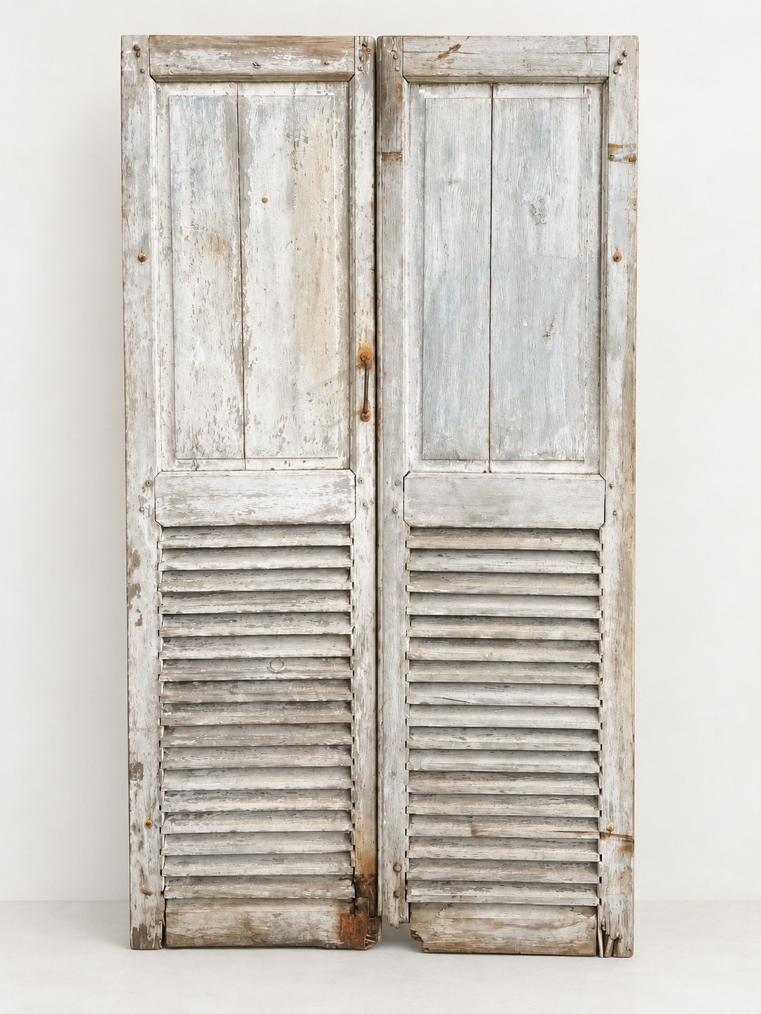 Vintage French weathered grey timber shutters with original hardware from Provence