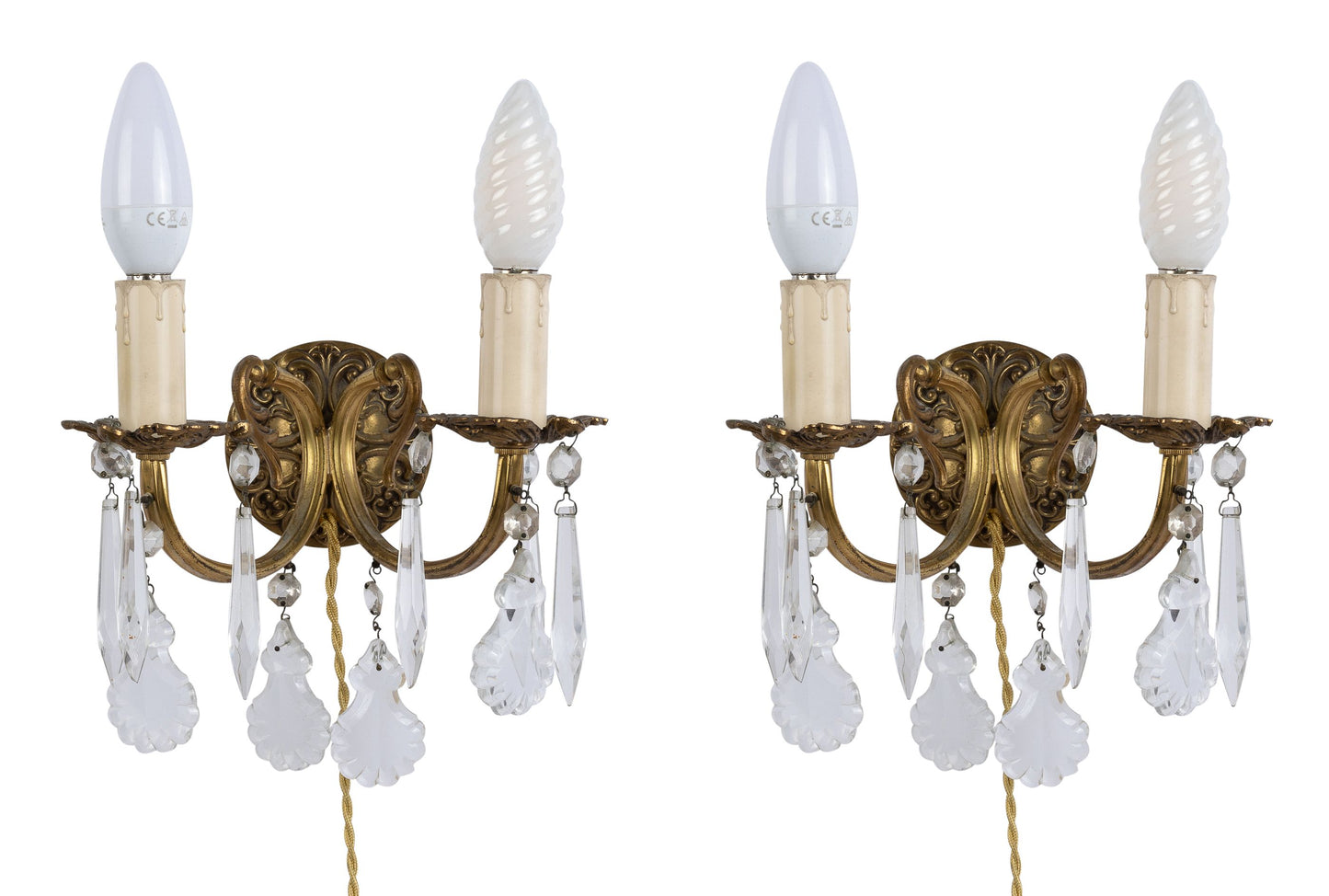 A superb pair of antique French brass wall sconces with a lovely variety of clear crystal drop gems