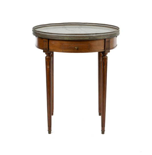 Beautiful and delicate ‘bouillotte ST LXVI' side table from Provence. With leather inlaid pull out small extension tables