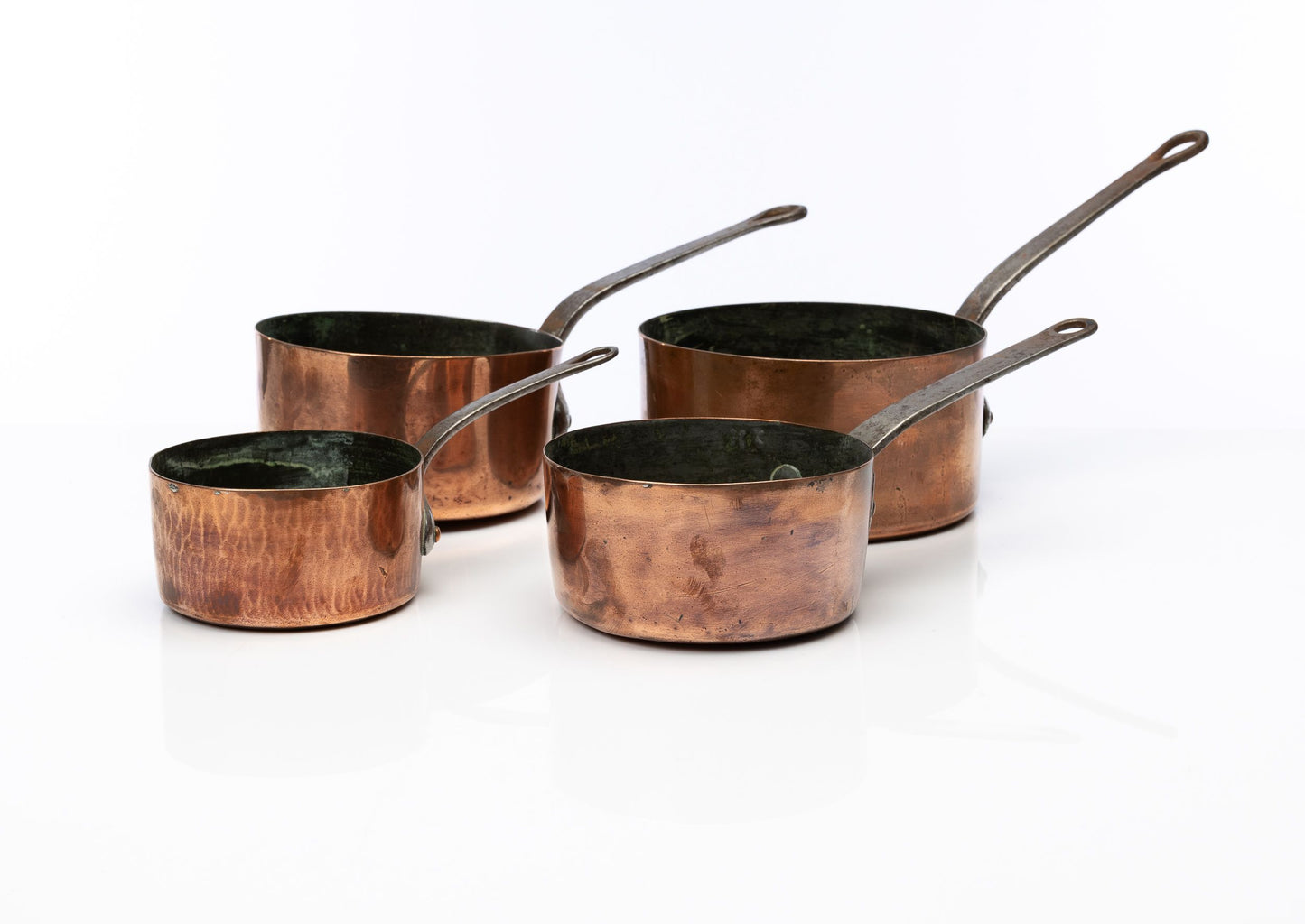 Set of 4 graduated Antique French copper saucepans from the Haute Savoie