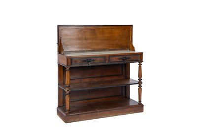 Antique French 19th Century buffet featuring ornate detailing and a beautifully carved crest and lift up top with marble inlay in a rich warm-toned wood from Provence