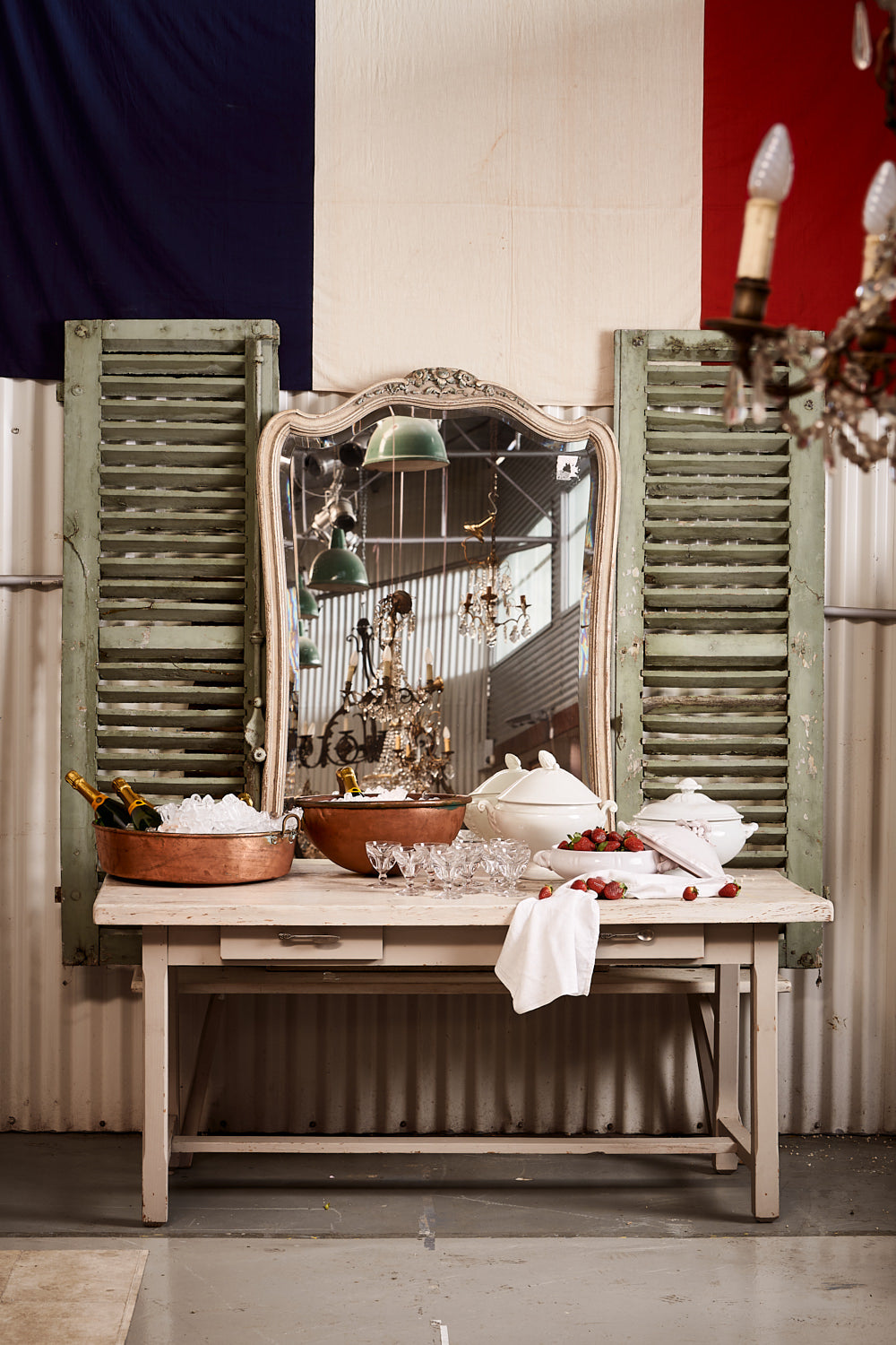 A pair of vintage French soft green/grey painted shutters from Provence.