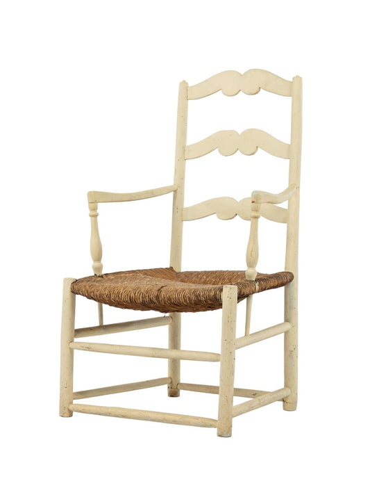 Elegant vintage French ladderback carver chair with cream-painted patina from Provence