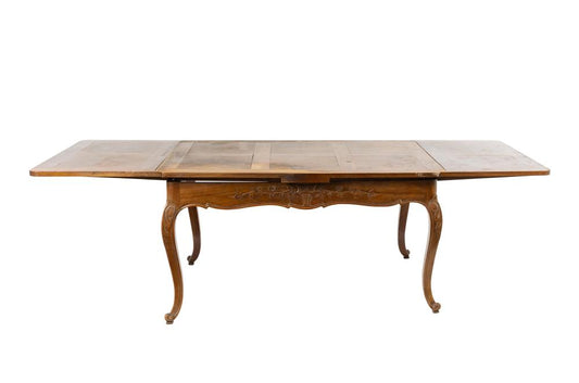 19th Century Antique French walnut Louis XV Style extendable dining table with floral hand carvings from Provence