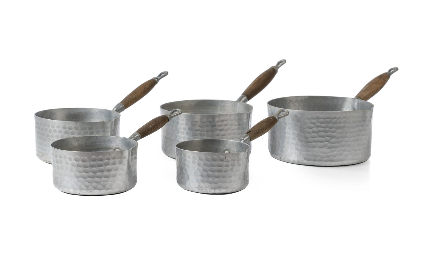 Gorgeous set of 5 vintage French aluminium pots with hammered finish and timber handles. Discovered in Provence