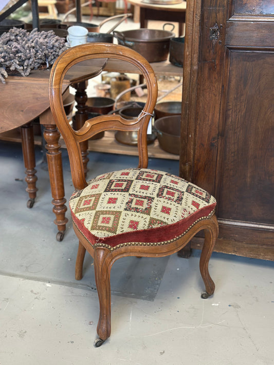 Antique French walnut balloon back dining chair