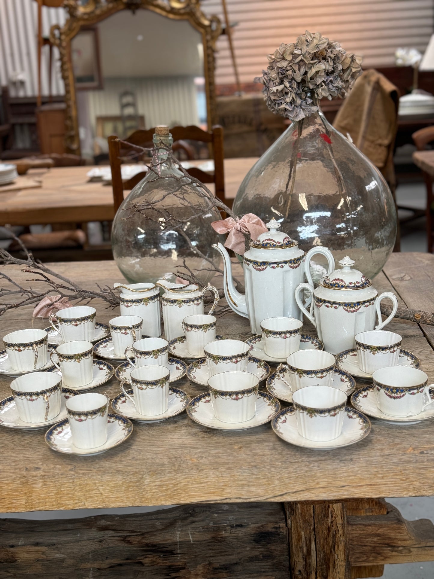 Delicate Antique French porcelain tea and coffee cup and saucers set from Paris.