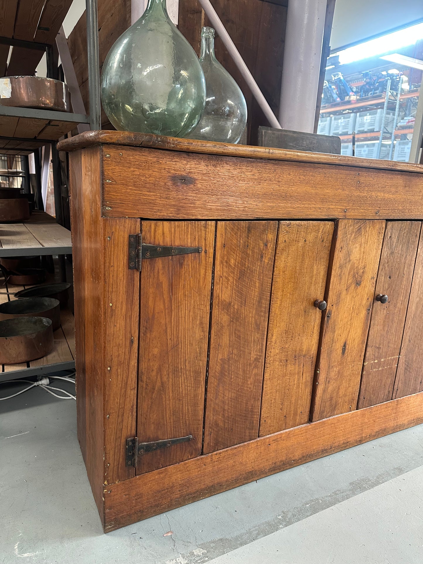 Vintage walnut farmhouse sideboard featuring internal shelves and a warm honey-coloured finish