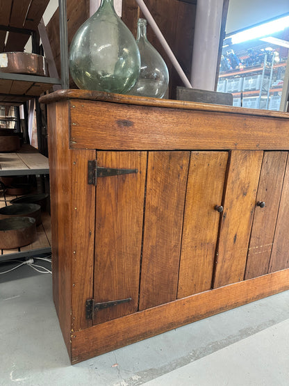 Vintage walnut farmhouse sideboard featuring internal shelves and a warm honey-coloured finish
