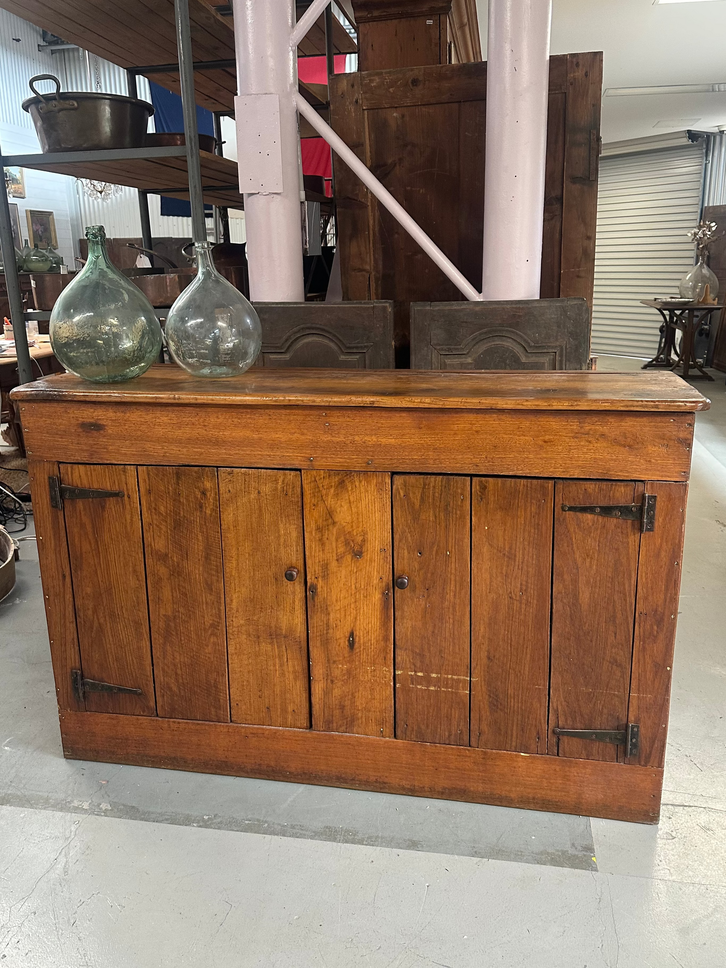 Vintage walnut farmhouse sideboard featuring internal shelves and a warm honey-coloured finish