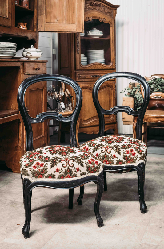 A pair of lovely black timber salon chairs with upholstered seats, from the French Alps