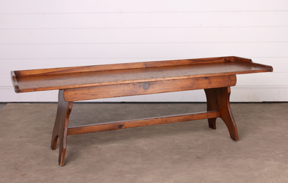Vintage French Alpine bench seat in a deep pine with trestle legs and stretcher bar from South of Grenoble