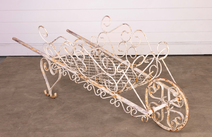 Charming Vintage French wrought iron garden wheel barrow from Provence with white painted patina