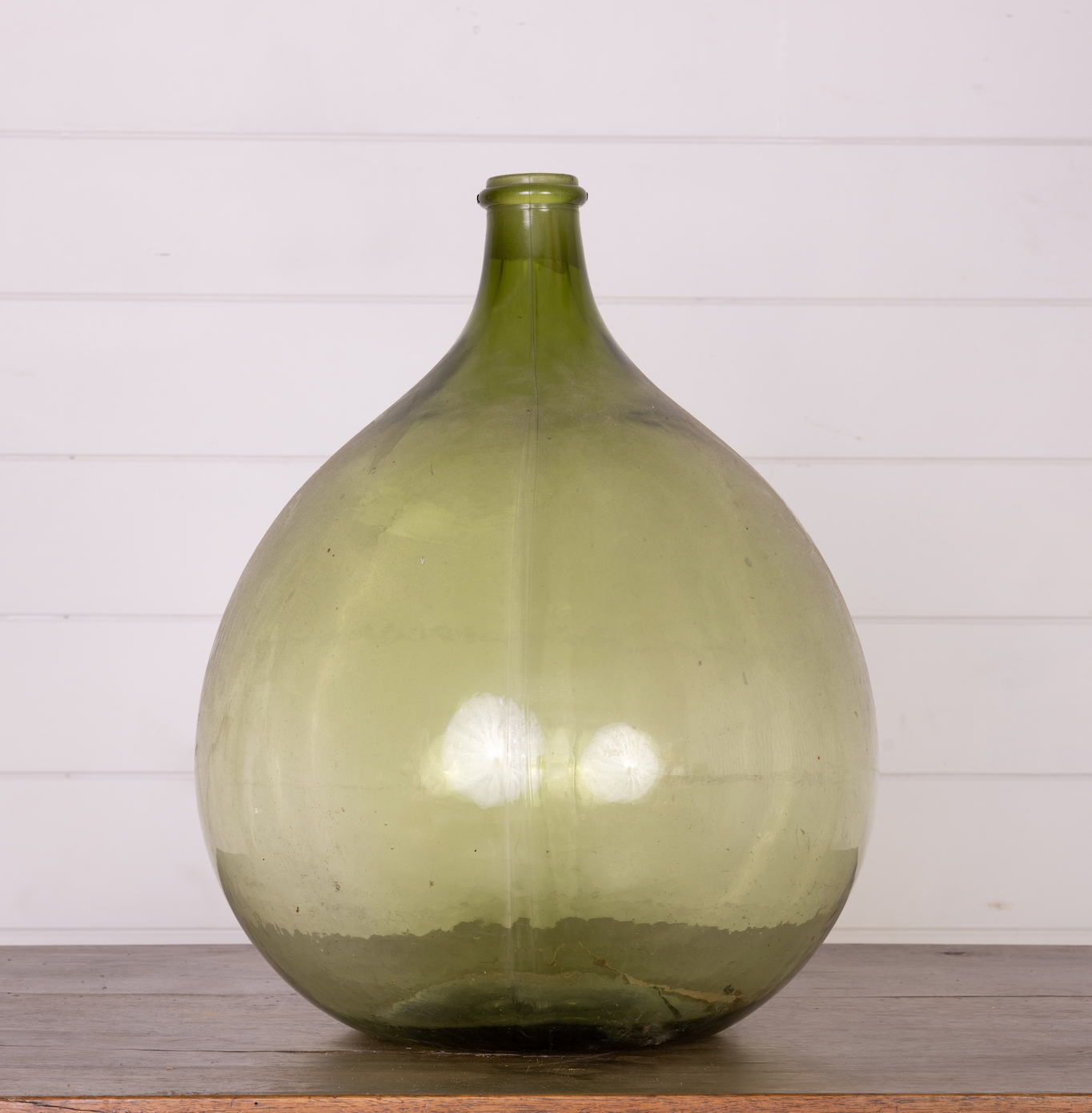 Beautiful large uniquely shaped Green blown glass demijohn from Nyons, France