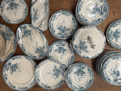 A beautiful and extensive 47-pieces antique French dinner service by Longwy, in the delicate Azalées pattern.
