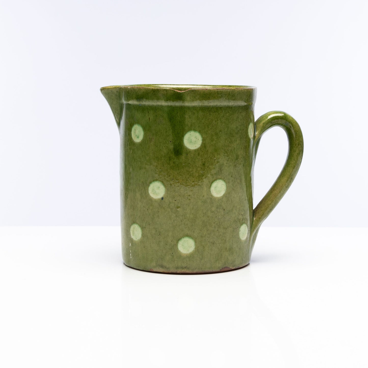 Traditional and collectible Savoyard Jug from the French Alps with green glaze and polka dot design