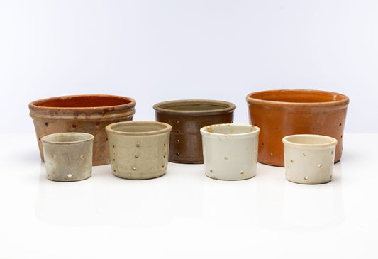 Beautiful collection of antique French 'Faisselle' pots from Provence