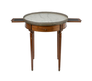 Beautiful and delicate ‘bouillotte ST LXVI' side table from Provence. With leather inlaid pull out small extension tables