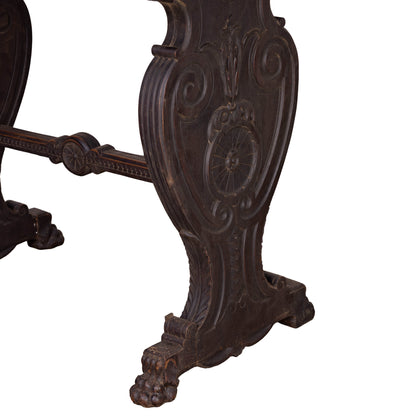Beautiful 18th century hall console table from a chateau in the Alps with decorative carvings and detailed stretcher base
