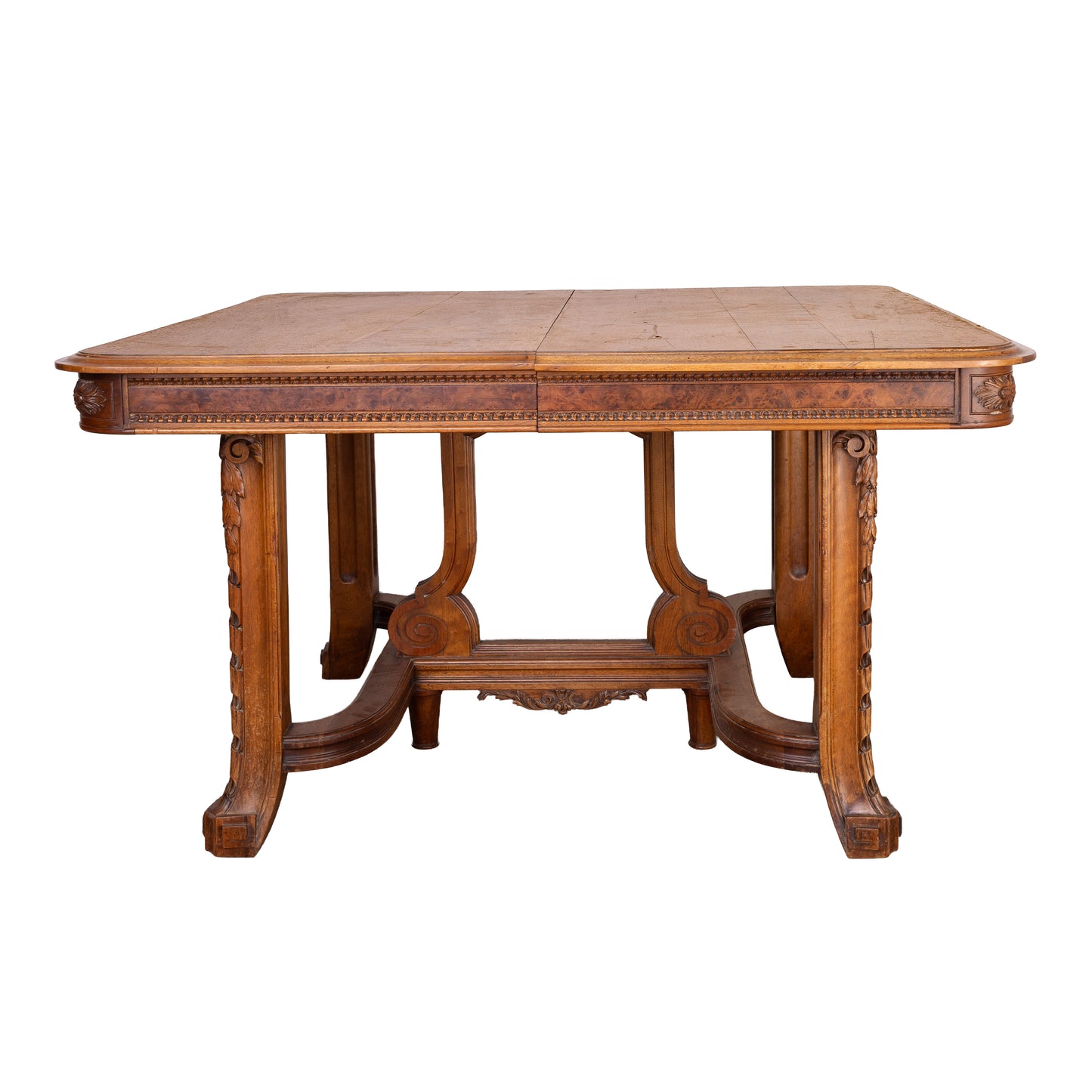 Antique French oak extendable dining table with intricate carvings and detailed stretcher base from Provence