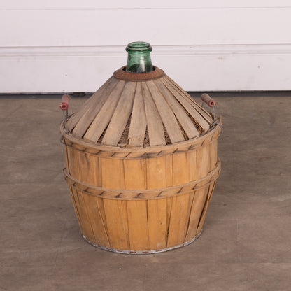 Antique French Demi John wine bottle in casing from Provence - part of a larger collection