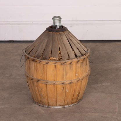 Antique French Demi John wine bottle in casing from Provence - part of a larger collection