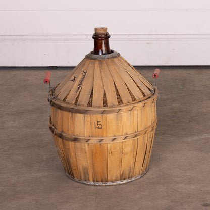 Antique French Demi John wine bottle in casing from Provence - part of a larger collection