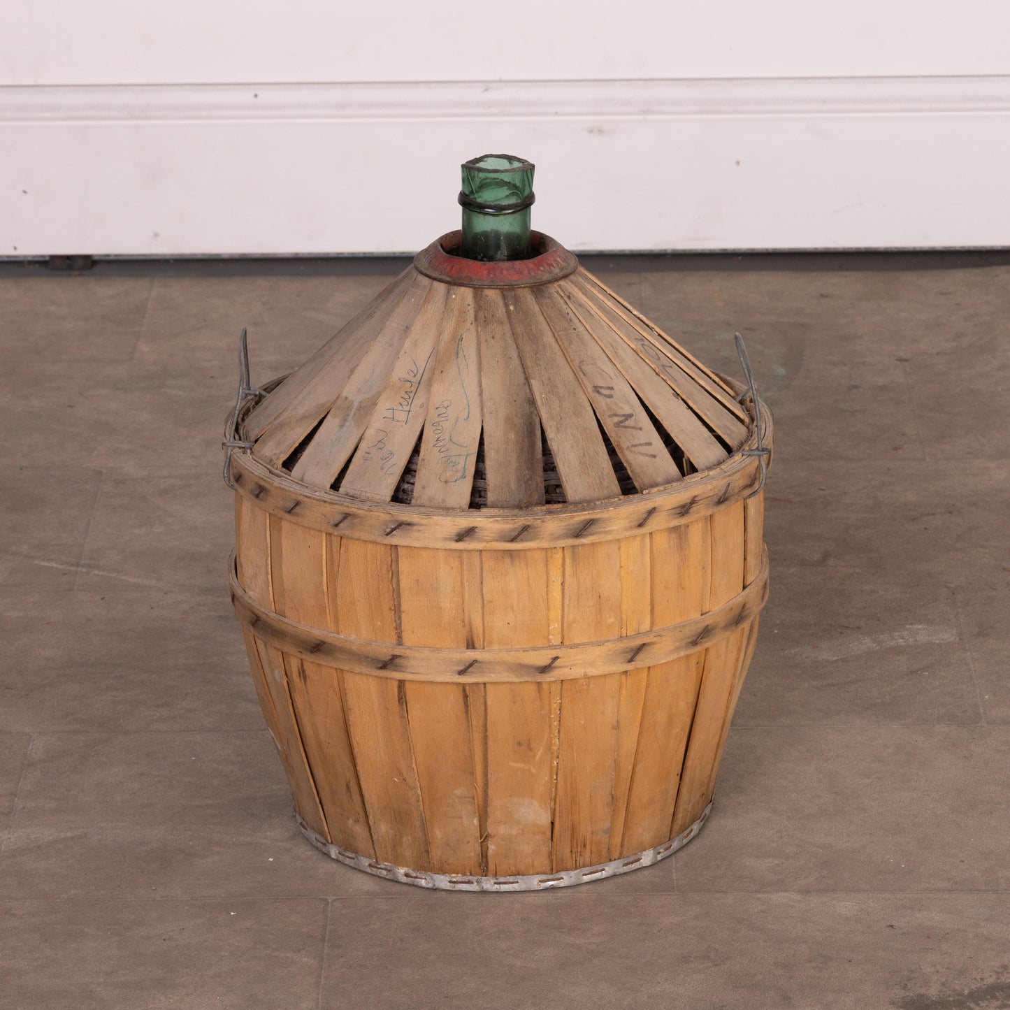 Antique French Demi John wine bottle in casing from Provence - part of a larger collection