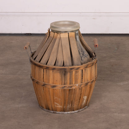 Antique French Demi John wine bottle in casing from Provence - part of a larger collection