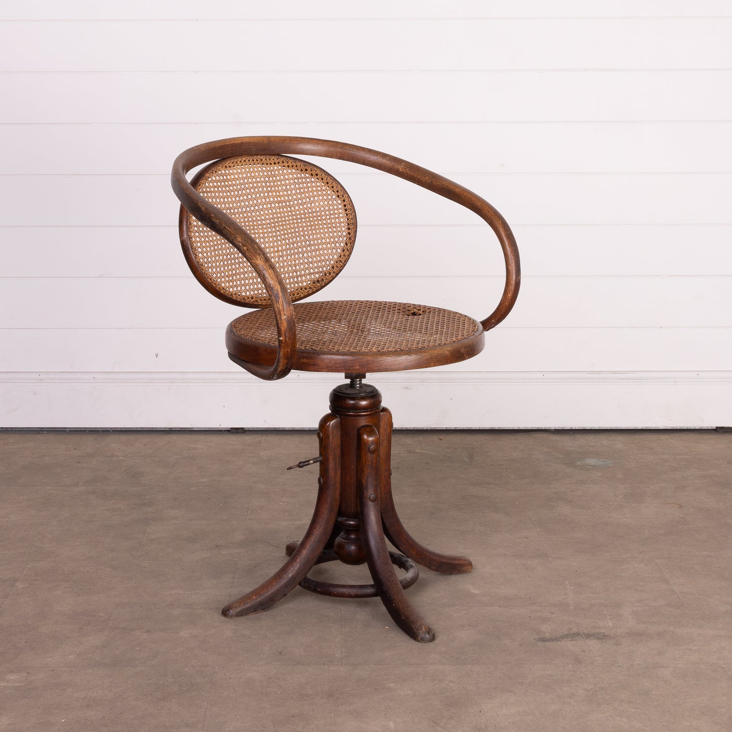 Rare antique French adjustable rotating Bentwood armchair with cane seat and back from Provence